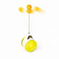 Yellow and white toy with a spinning orange ball on a white background