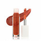 Lip gloss with applicator and swatch on a white background PUMPKIN - BRICK RED