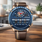Luxury watch with blue face and brown leather strap on a wooden surface