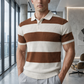Man wearing a brown and white striped polo shirt in an office setting