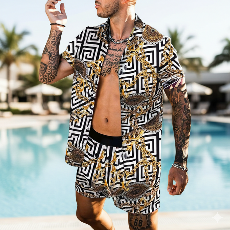 Man wearing a patterned shirt and shorts with gold chains by a poolside.