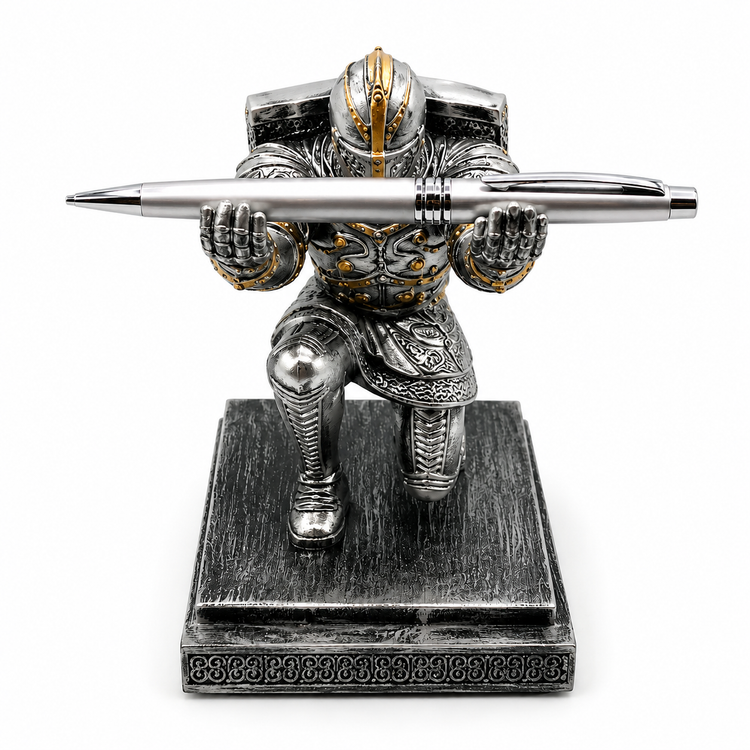 Metallic warrior figurine with a pen on a white background