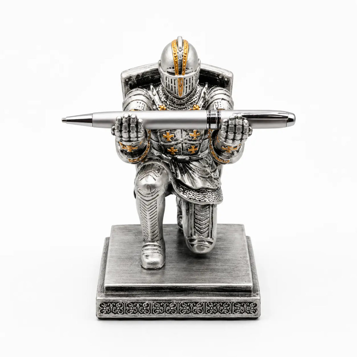 Medieval knight pen holder features a silver and gold armor design, holding a pen across its chest on a square base.