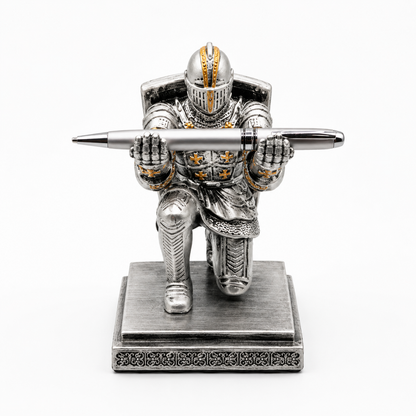 Decorative pen holder in the shape of a knight holding a sword on a white background