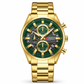 Gold wristwatch with a green face on a white background