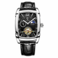 Luxury watch with black leather strap and visible brand logo on a white background