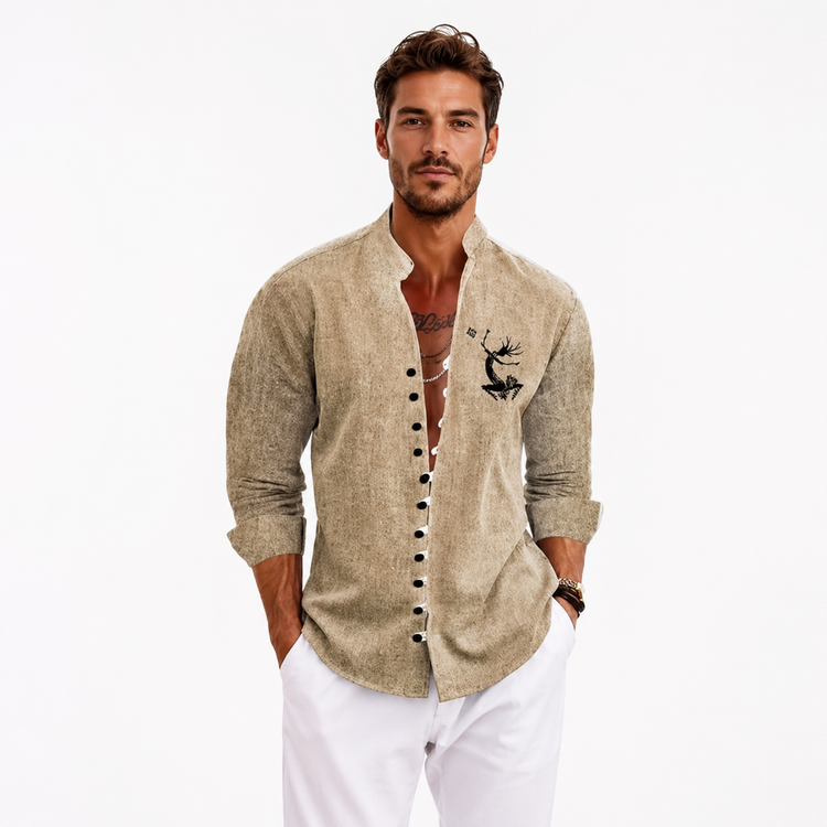 Man wearing a beige button-up shirt with a deer design on a white background