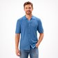 Man wearing a blue textured shirt on a white background