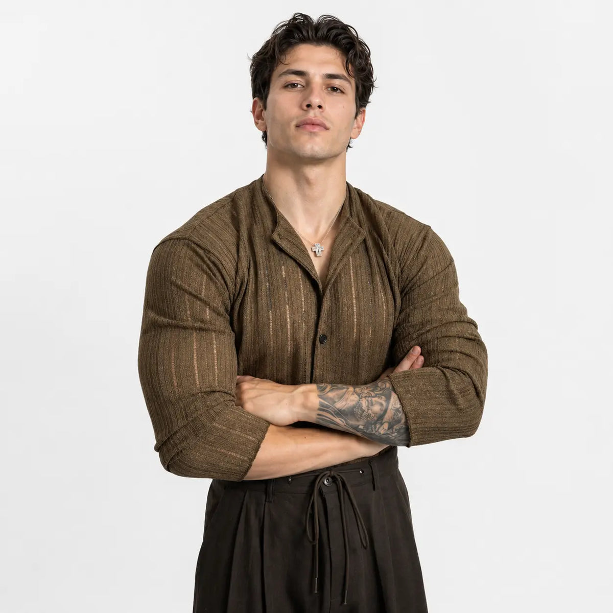 Solid color men's cardigan - stylish hemp blend in olive green, worn by a model with arms crossed, front view