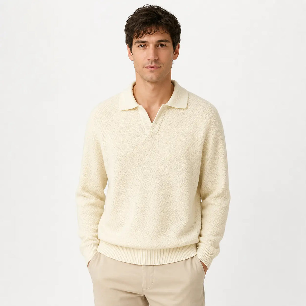 Men's slim fit polo sweater in cream worn by a model with hands in beige pants pockets against white background