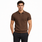 Man wearing a brown ribbed polo shirt and black pants on a white background
