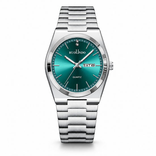 Silver watch with a teal face on a white background