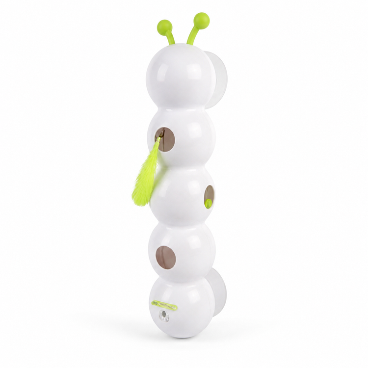 Toy resembling a caterpillar with white body, green antennas, and brown spots on a white background