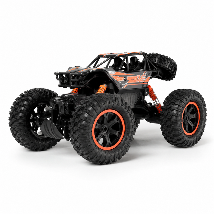 Black and orange remote control monster truck on a white background