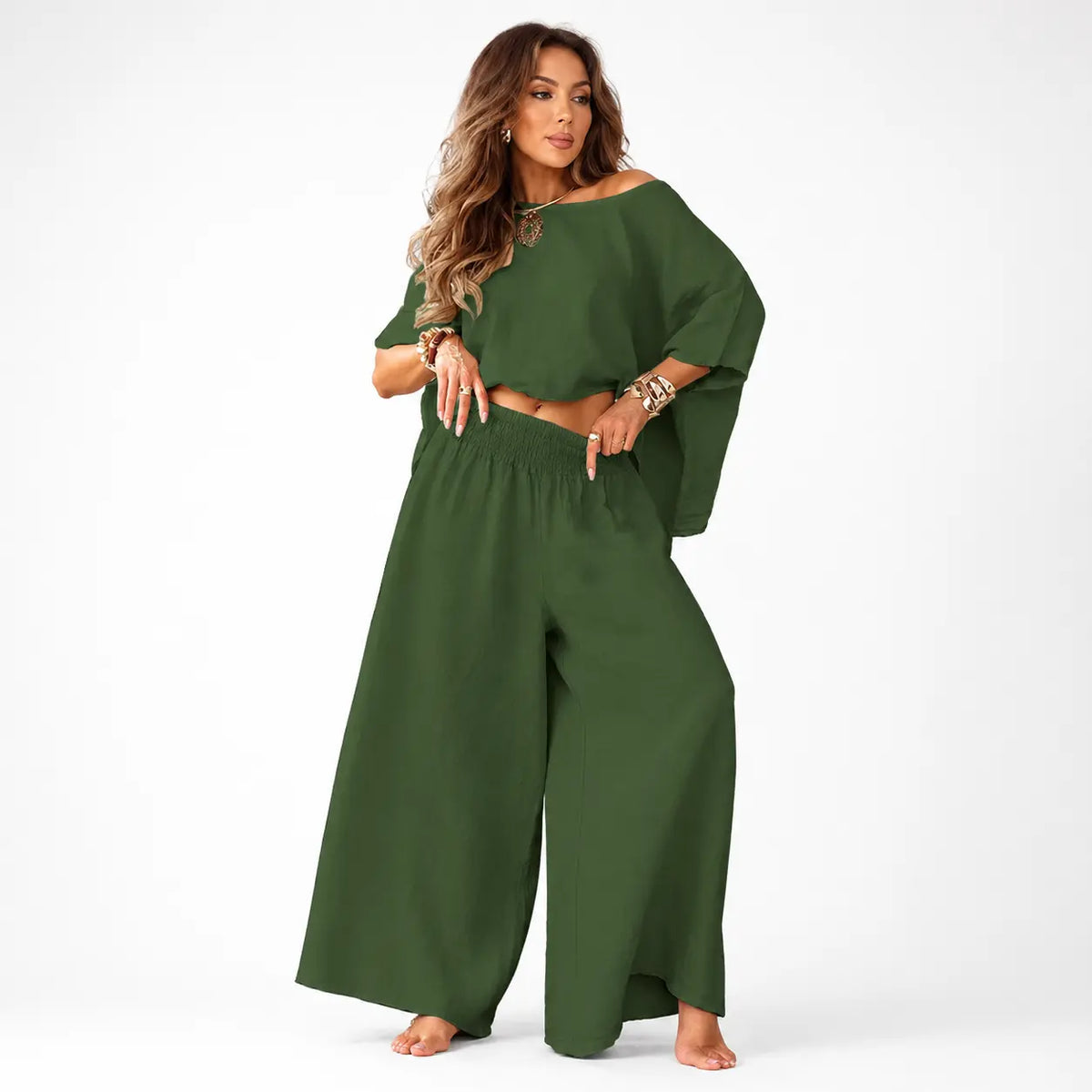 Woman wearing a green outfit on a white background