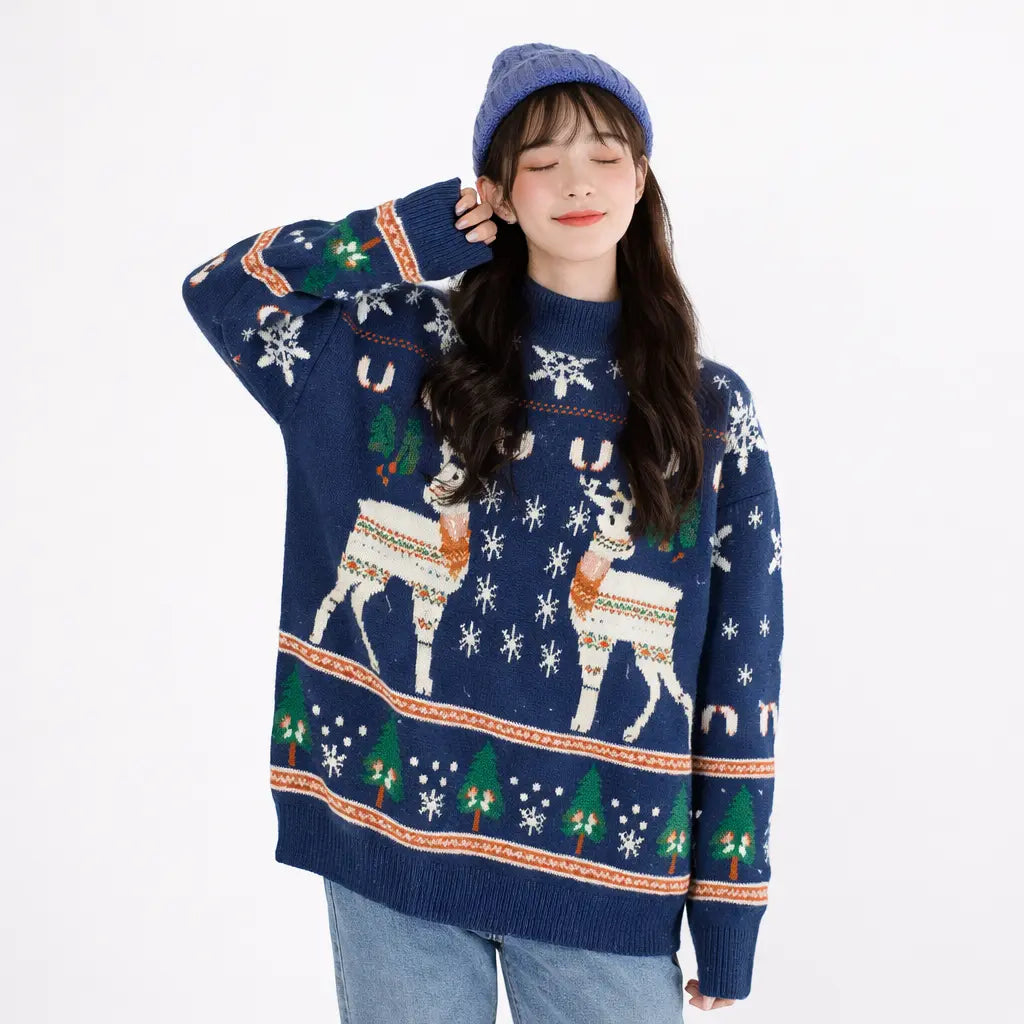 christmas elk knit sweater in navy blue, worn by a model with a matching beanie, featuring white elk, trees, and snowflake motifs on the front and sleeves.