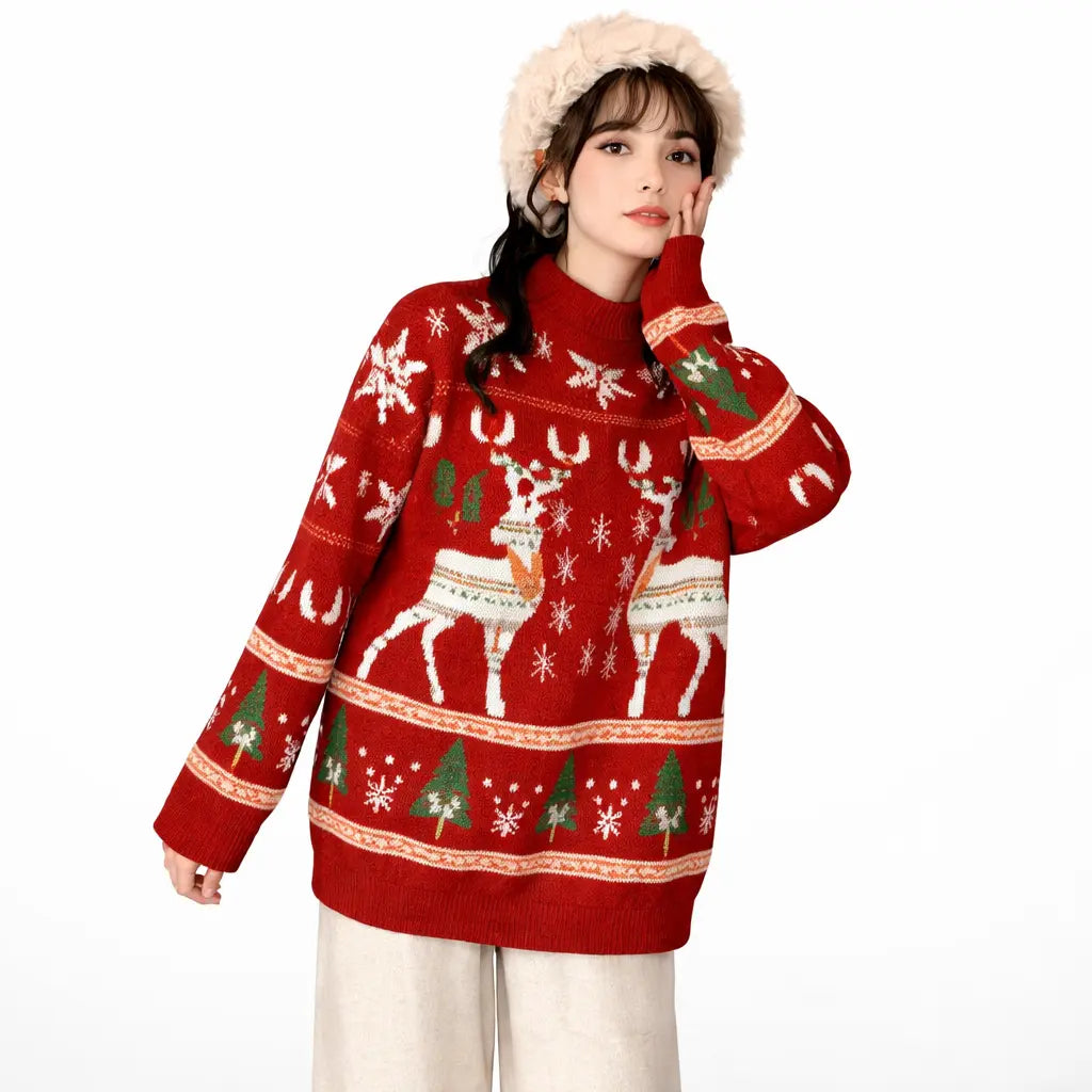 christmas elk knit sweater in navy blue, close-up side view showing the white and orange patterns and the ribbed knit cuff.