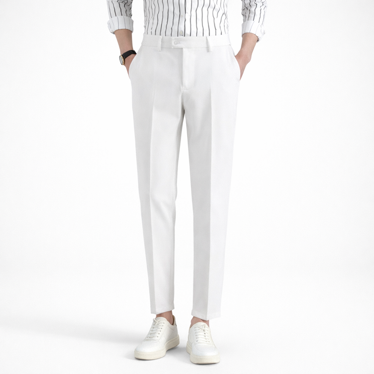 Person wearing white pants and a striped shirt on a white background