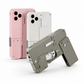Metallic gun-shaped phone case with two smartphone cases in pink and white on a white background