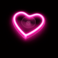 Pink heart-shaped neon light on a black background