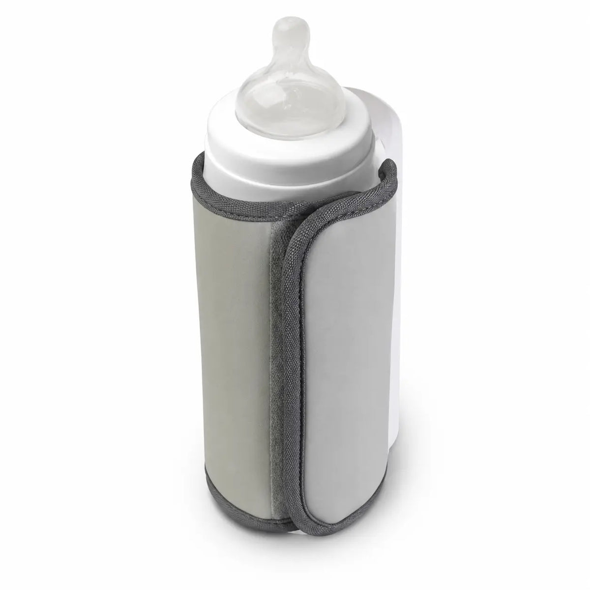 Portable electric baby bottle warmer with gray fabric straps securing a white bottle, side view