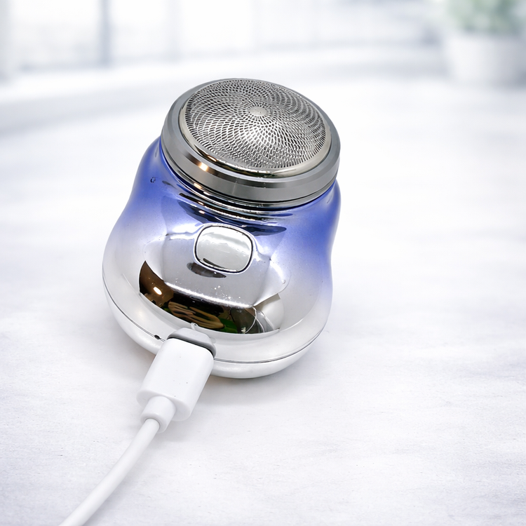 Portable electric shaver with charging cable on a white background BLUE