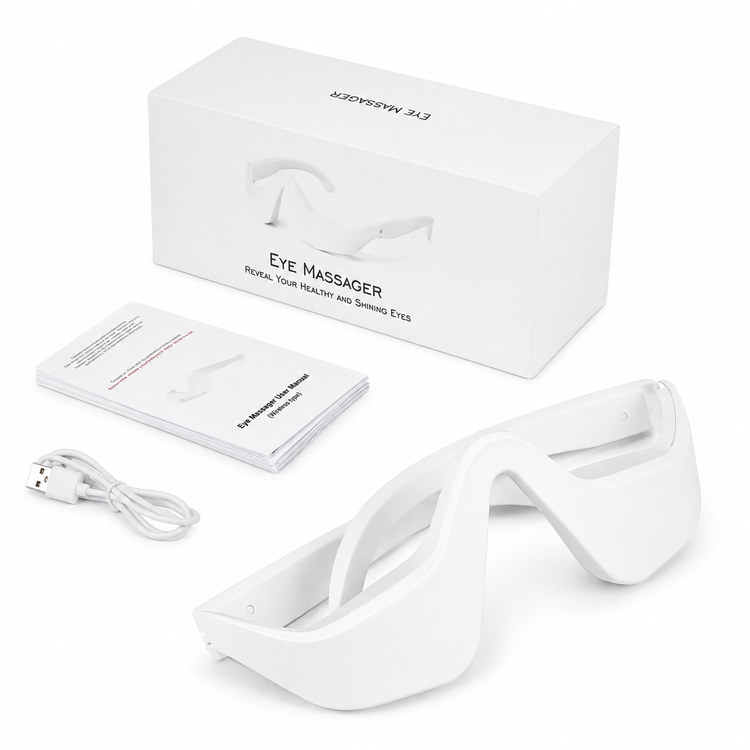 White eye massager device shown with its white retail box, instruction booklet, and USB charging cable on a clean white background.