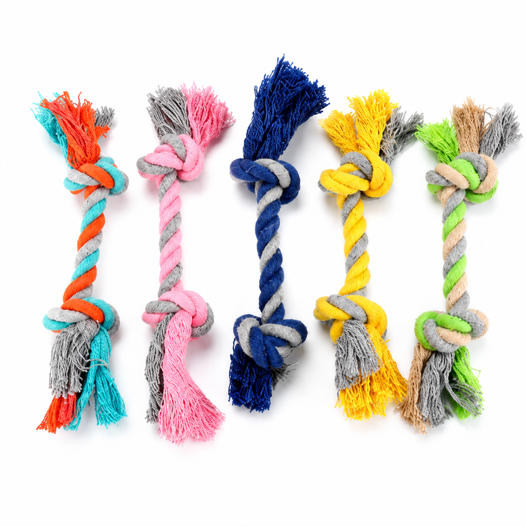 Five colorful knotted rope toys on a white background