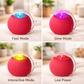 Red ball with LED lights in different modes on a blurred indoor background