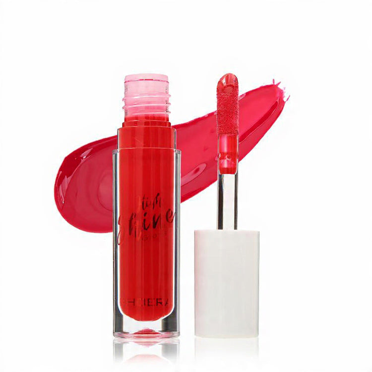 Red lip gloss with applicator and stand on a white background SOUR - CHERRY RED
