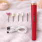 Red nail drill with attachments on a soft surface RED