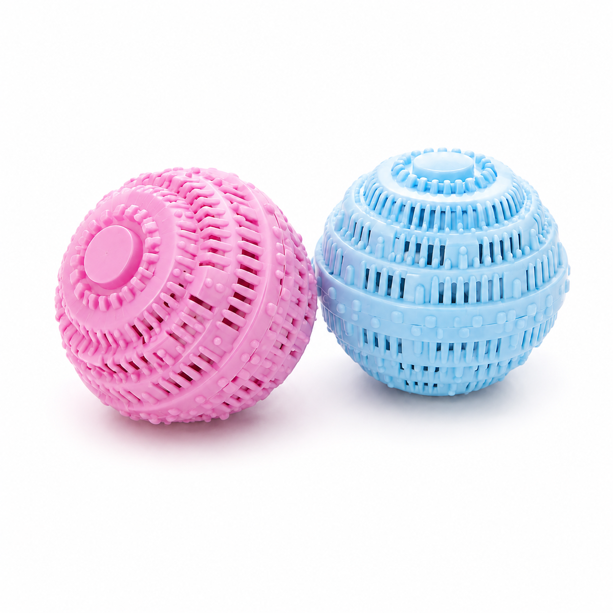 Pink and blue laundry balls on a white background