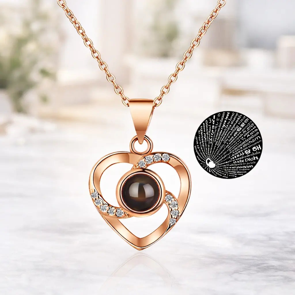 Projection pendant necklace for women featuring a rose gold heart-shaped design with a brown gemstone and small diamonds.
