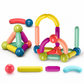 Colorful magnetic building toy set on a white background
