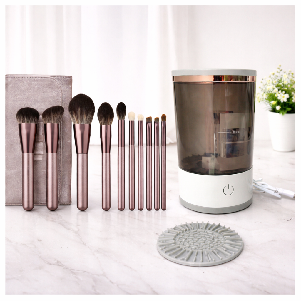 Set of makeup brushes with a cleaning device on a marble surface