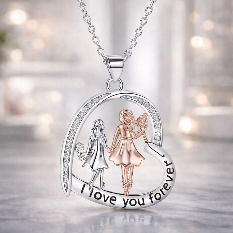 Silver necklace with a pendant featuring two girls and &