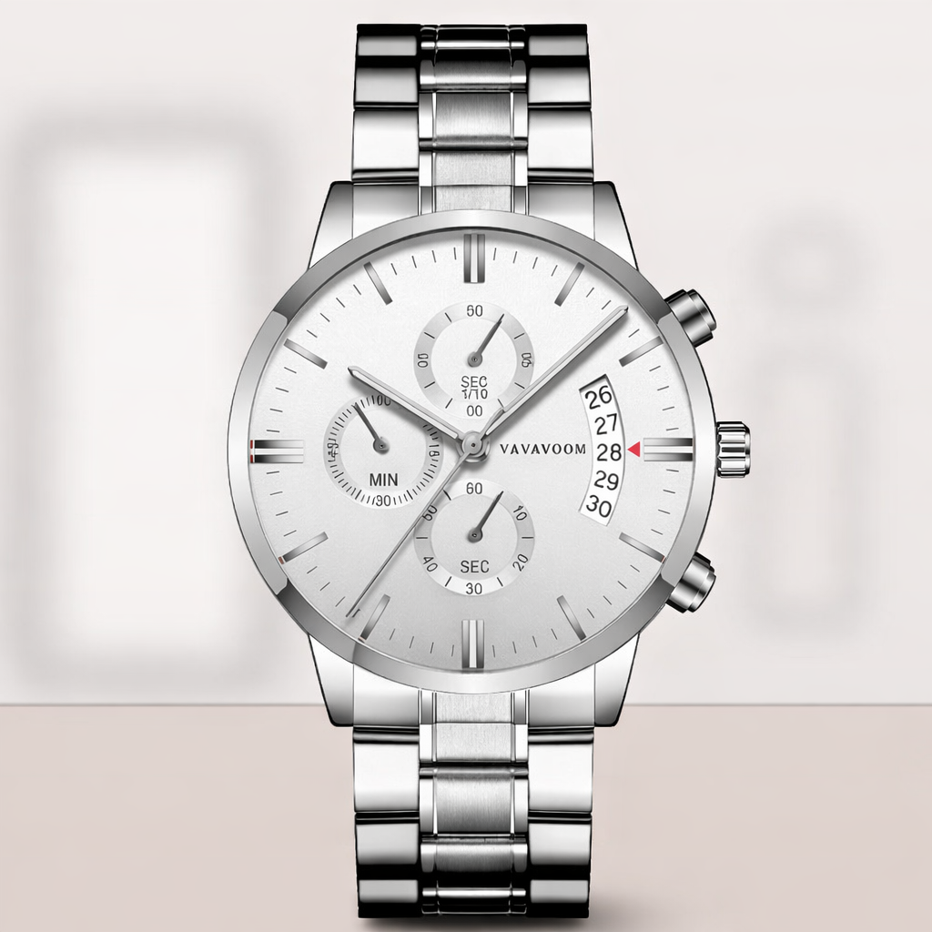 Silver wristwatch with a detailed face on a light gray background