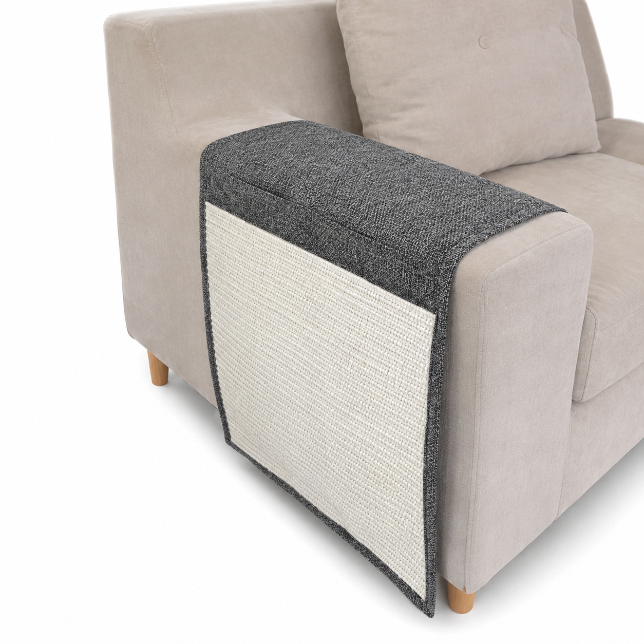 Sofa armrest cover with textured gray and white design on a beige sofa.