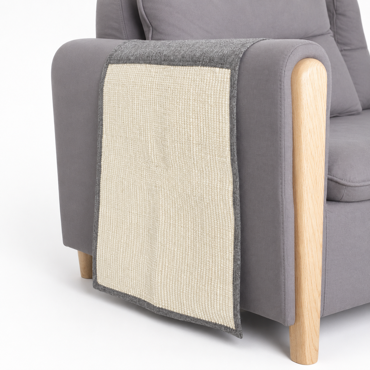 Gray armchair with a textured beige cushion on a white background