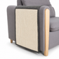 Gray armchair with a textured armrest cover on a white background