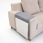 Gray and white pet bed on a beige sofa