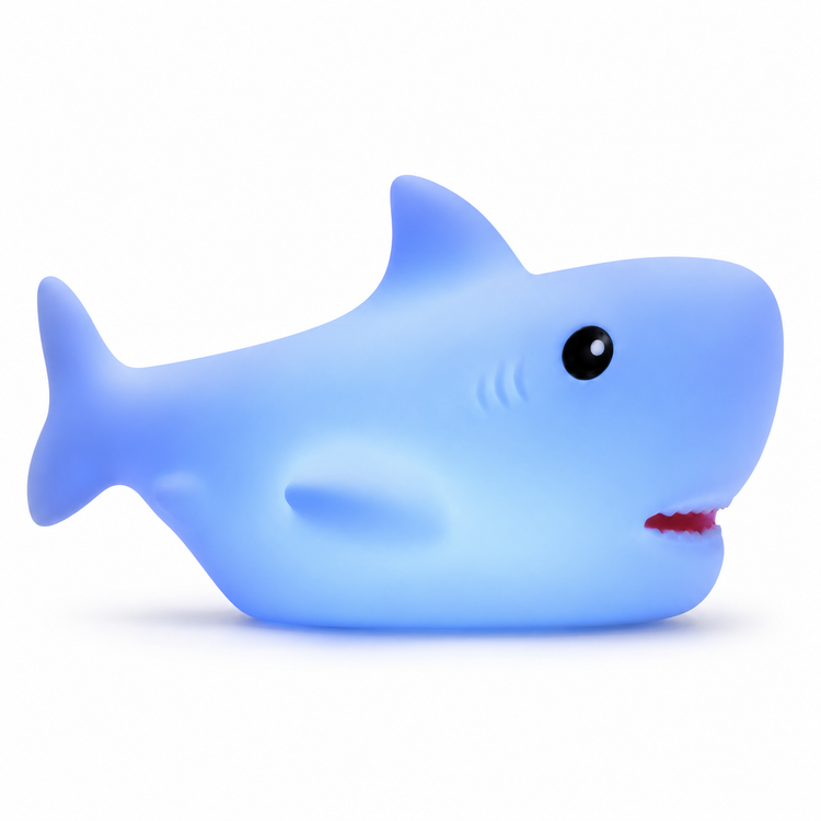 Blue shark-shaped toy on a white background