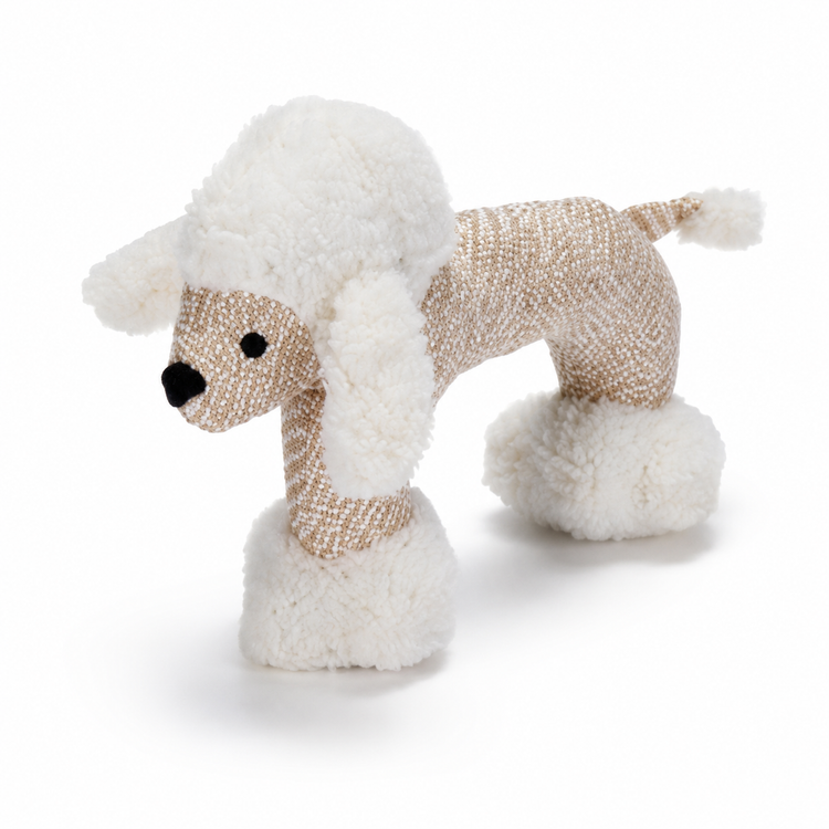 Stuffed toy poodle with white fur and beige body on a white background