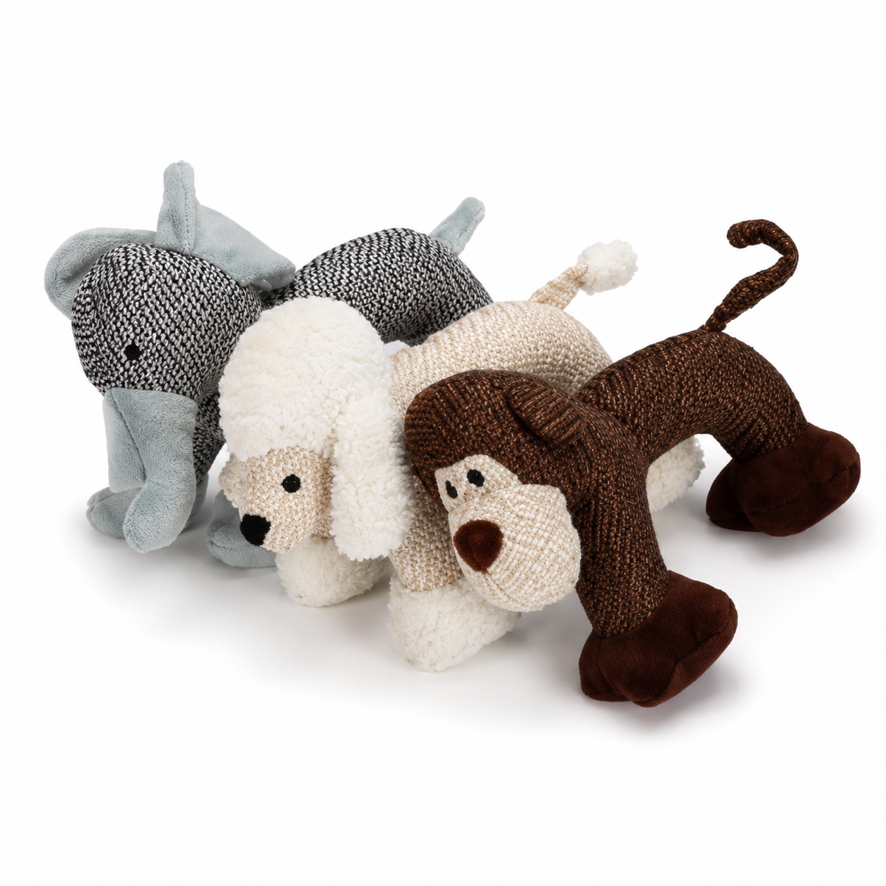 Three knitted animal toys in gray, white, and brown on a white background