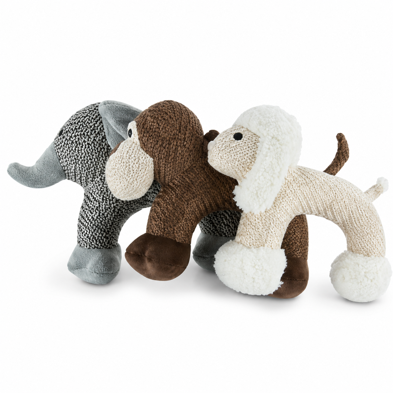 Three knitted dog toys in gray, brown, and beige on a white background