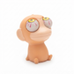 A small peach-colored novelty figurine shaped like a cartoon creature with oversized white eyeballs featuring yellow irises and red veins, photographed on a clean white background.