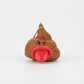 A brown poop-shaped squishy keychain with a red tongue sticking out, black drawn eyes, and a silver ball chain, photographed on a clean white background.