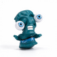 A novelty plastic toy figure shaped like a zombie, featuring a dark teal-green body, large white eyes with blue irises, and an open mouth showing white teeth, set against a plain white background.