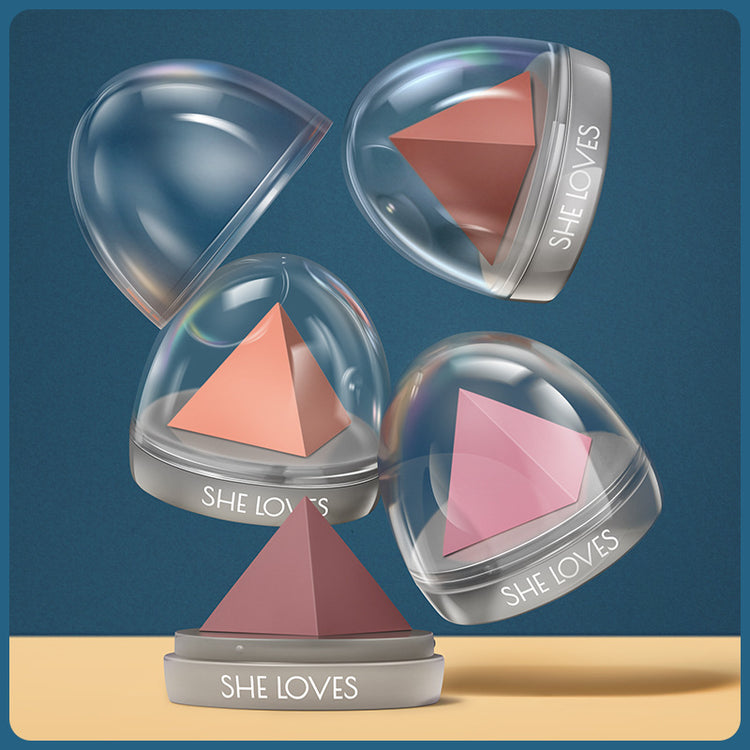Three pyramid-shaped objects in clear domes with &