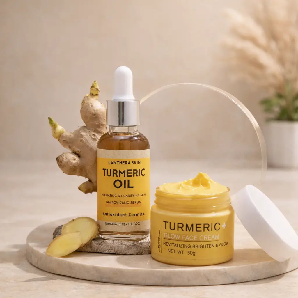 turmeric skincare set featuring yellow cream jar and oil bottle on stone base with turmeric root